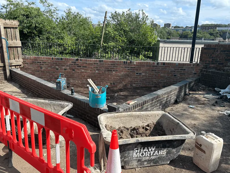 Drainage works behind safety barriers