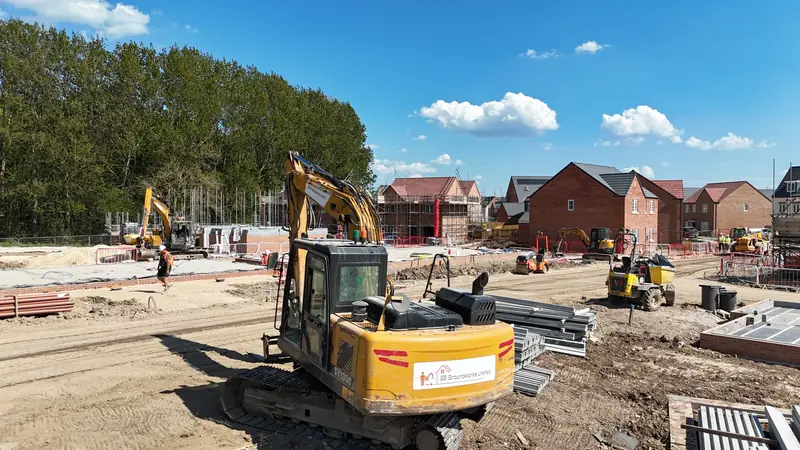 Excavator working on a new-build housing site