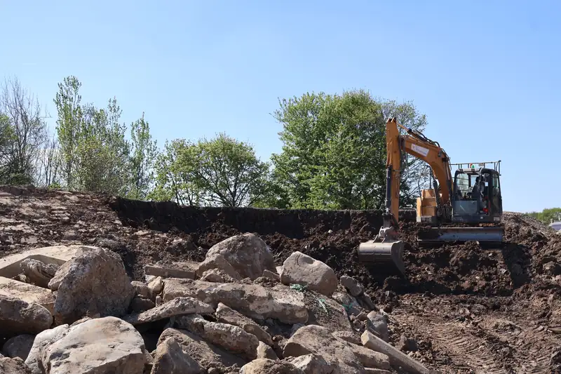 GE Groundworks excavator carrying out earthworks on site